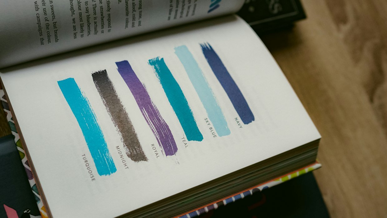 Coloured tabs marking pages in a book.