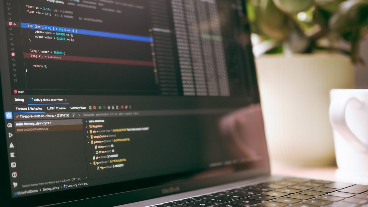A plain text editor open on a laptop.