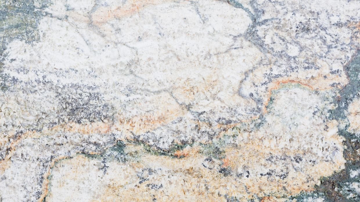 A smooth, polished stone surface.