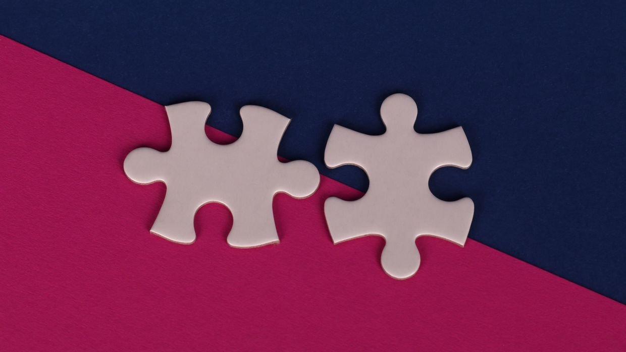 Two puzzle pieces that do not fit together.